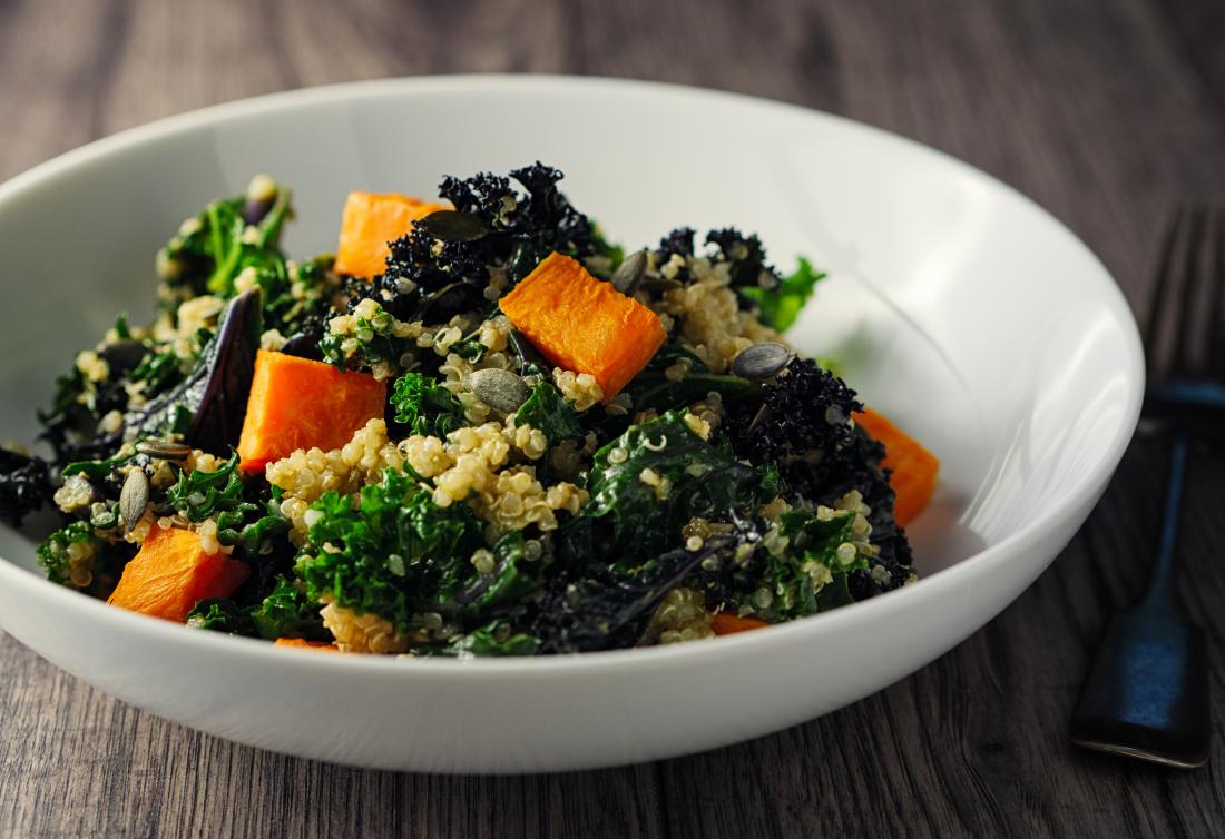 Sweet potato, kale and quinoa salad with dark leafy greens and vitamin a for skin