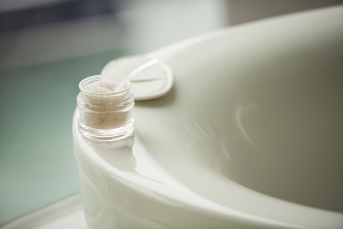 Body scrub in a bathroom to get rid of razor bumps.