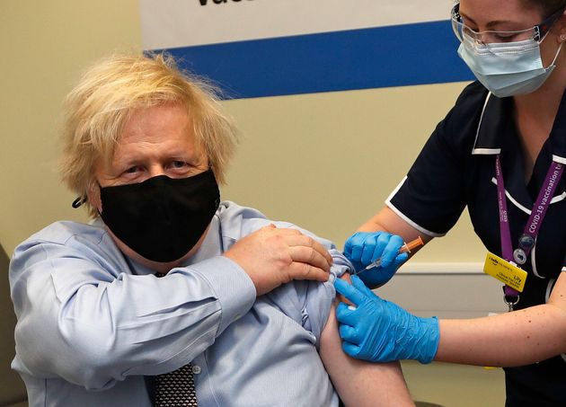 Boris Johnson receives the first dose of the AstraZeneca vaccine administered by nurse and clinical pod...