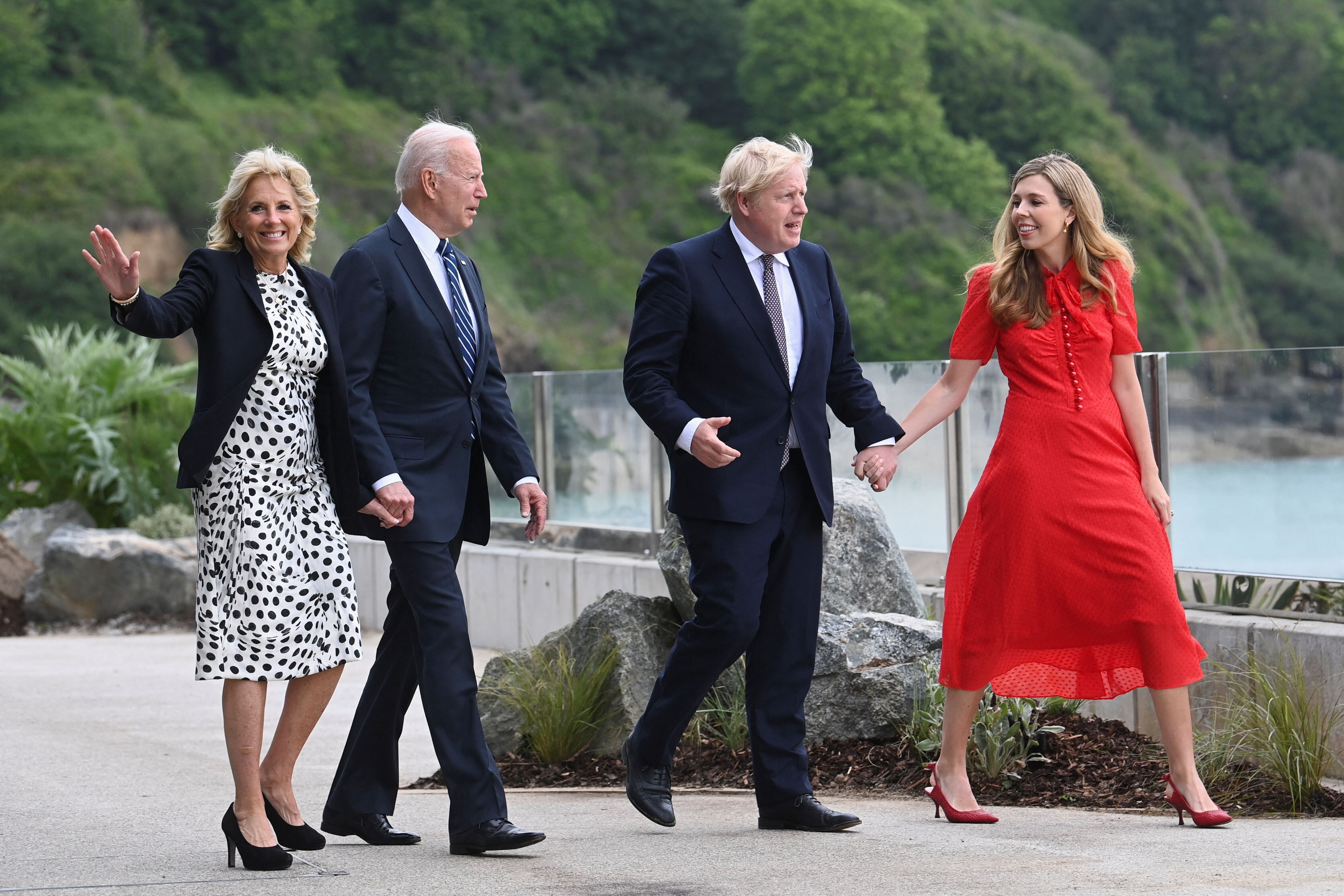 Boris Johnson and his wife Carrie Johnson  walk with US president Joe Biden and US first lady Jill...