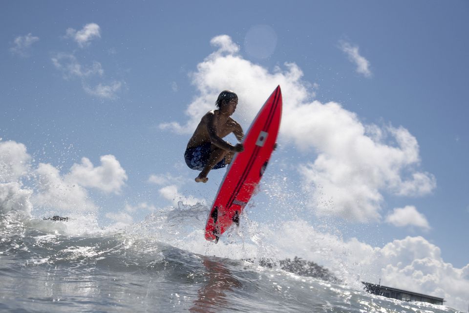 Japan's Kanoa Igarashi rides a wave during a free training session at the Tsurigasaki Surfing