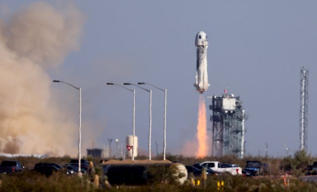 Blue Origin’s New Shepard lifts-off from the launch pad carrying 90-year-old Star Trek actor William...
