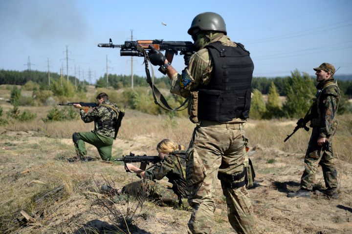 Ukrainian soldiers practice shooting during a military drill in the village of Schastya, near the eastern Ukrainian town of Luhansk, on Sept. 20, 2014. The journalist who took this photo, Maks Levin, has been missing since March 13, 2022, when he was covering the Russian invasion of Ukraine in an area near Kyiv.