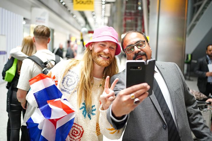 Sam posing for a selfie at Heathrow Airport