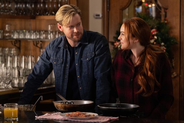 Chord Overstreet (left) and Lindsay Lohan in Netflix's Falling for Christmas, out 10 November