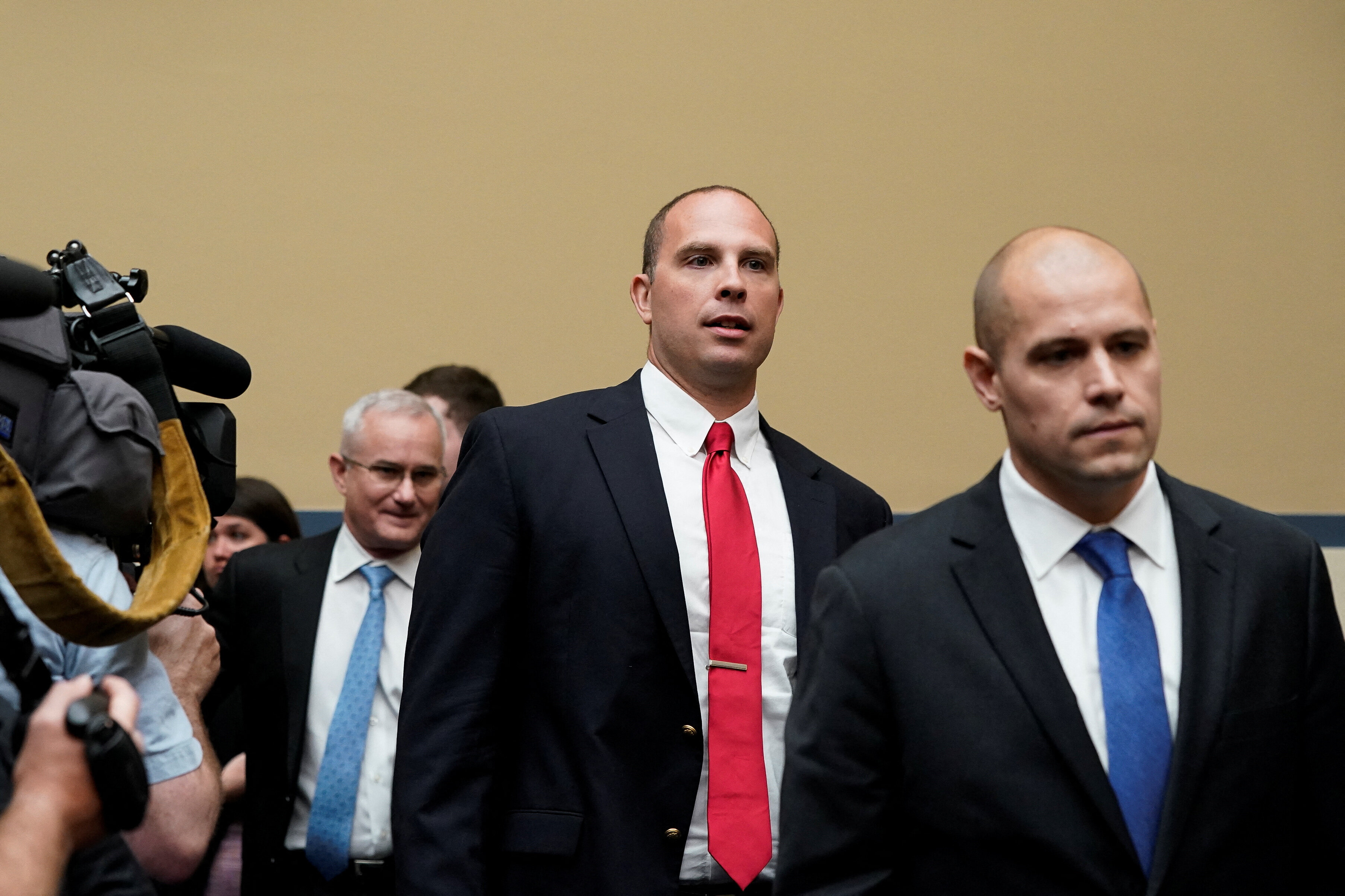 Ryan Graves, executive director of Americans for Safe Aerospace, David Grusch, former National Reconnaissance Office representative on the Defense Department's Unidentified Aerial Phenomena Task Force, and retired Navy Commander David Fravor arrive for House Oversight & Accountability Committee's National Security, the Border, and Foreign Affairs Subcommittee's hearing on "Unidentified Anomalous Phenomena: Implications on National Security, Public Safety, and Government Transparency" at the U.S. Capitol Hill in Washington, U.S., July 26, 2023. REUTERS/Elizabeth Frantz