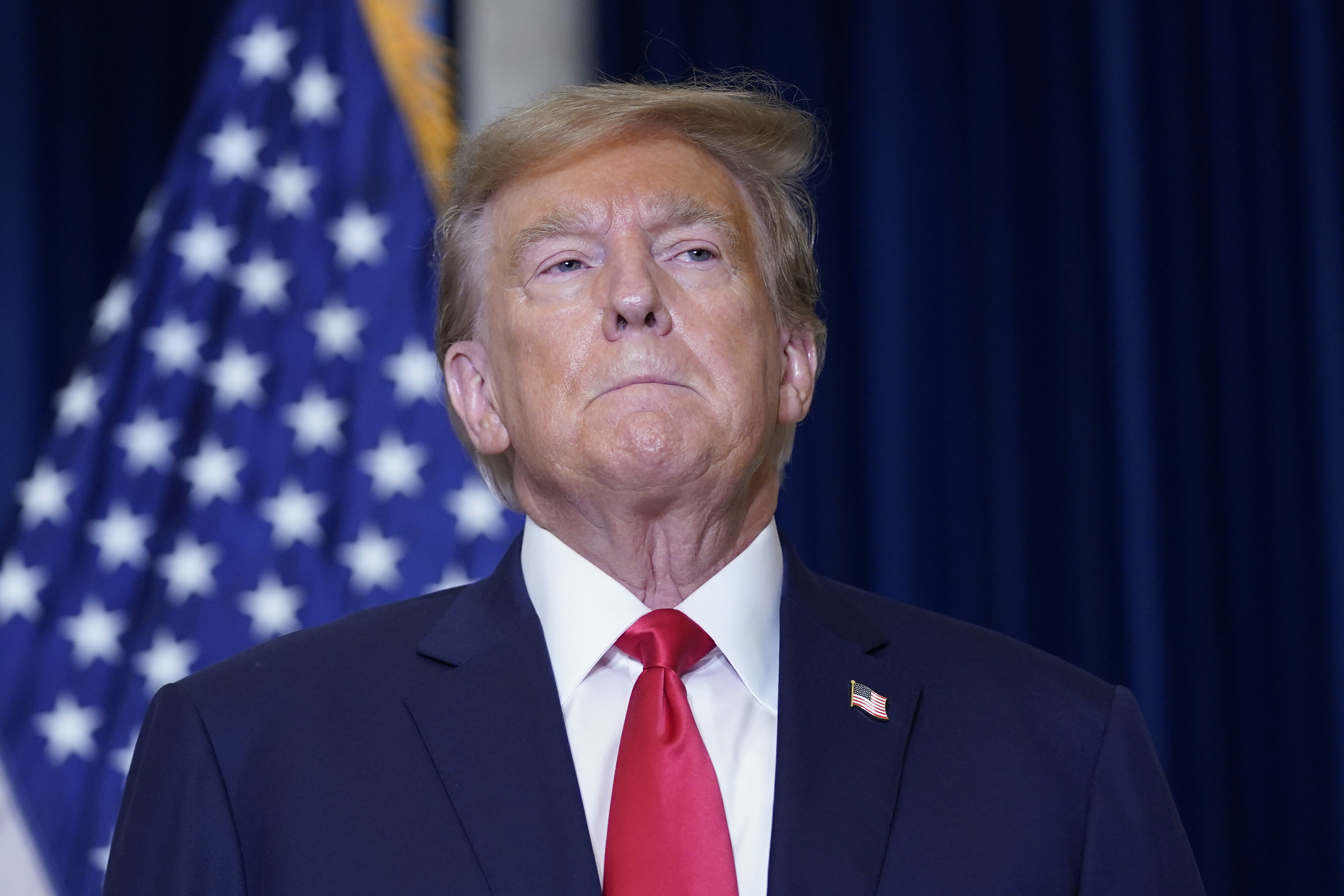 Former President Donald Trump speaks to the media at a Washington hotel on Tuesday, Jan. 9, 2024.