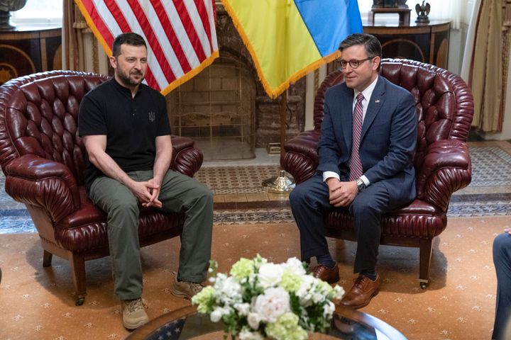 Speaker of the House Mike Johnson (R-La.), right, meets with Ukrainian President Volodymyr Zelenskyy at the Capitol July 10 in Washington.